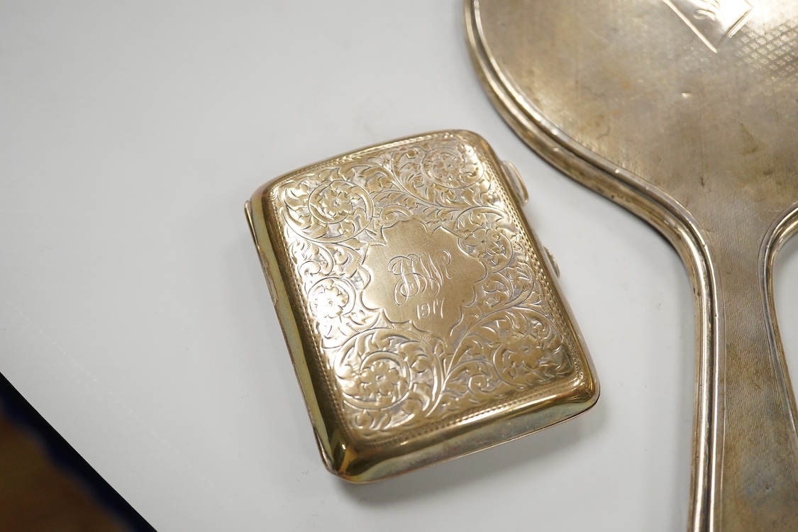 Sundry small silver, including two cigarette cases, a match sleeve holder, three napkin rings, two condiments, matchbox sleeve, shaving brush canister, commemorative small dish, a mounted hand mirror and mounted handbag